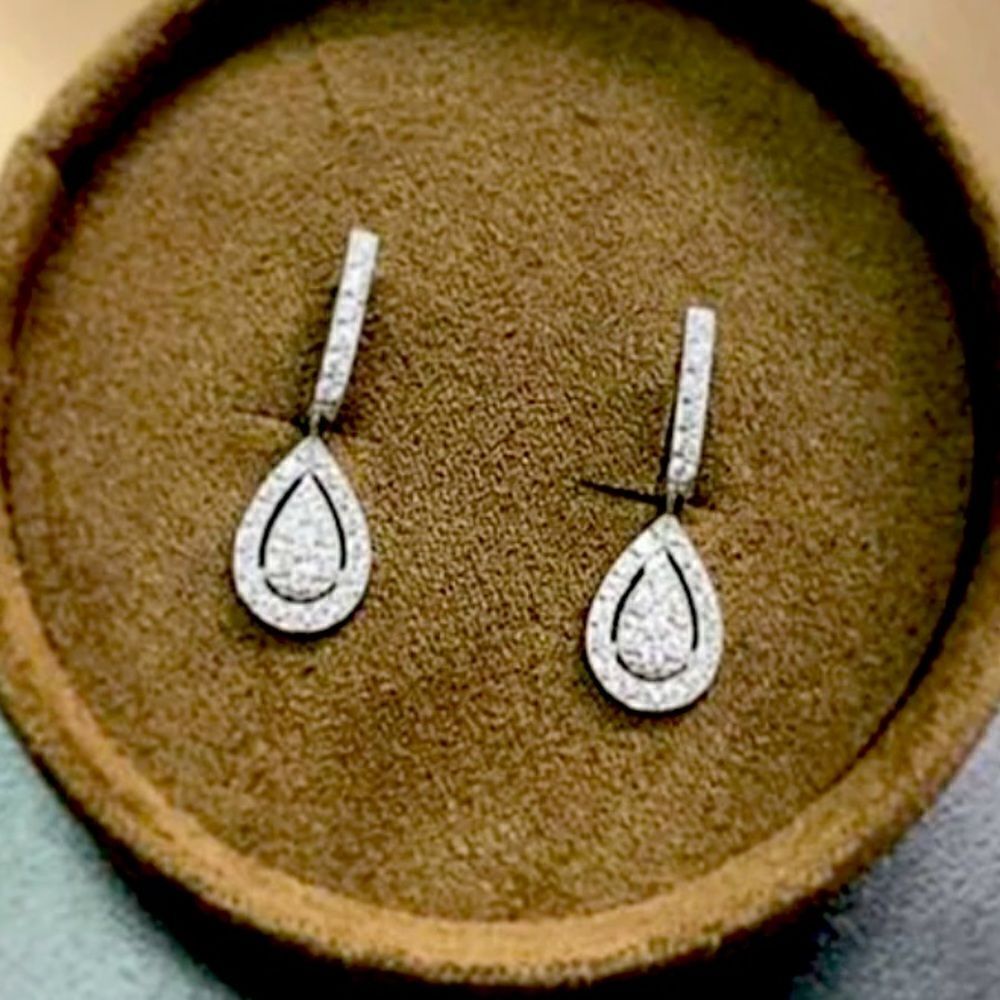 The Stately Dangle Tear Drop earrings in cubic zirconia
